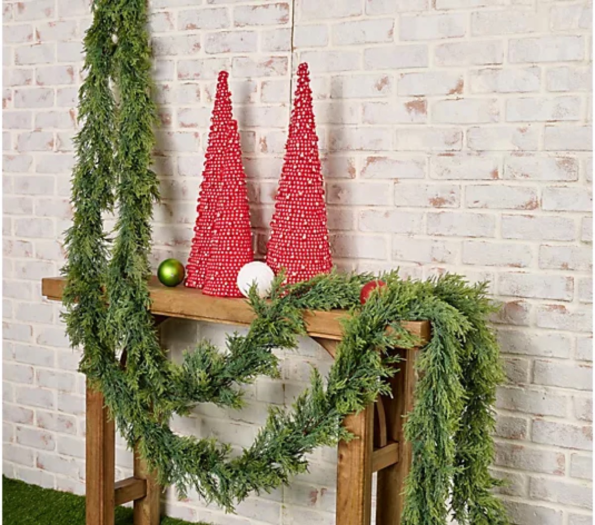How to Decorate a Christmas Mantel With Lush Garlands